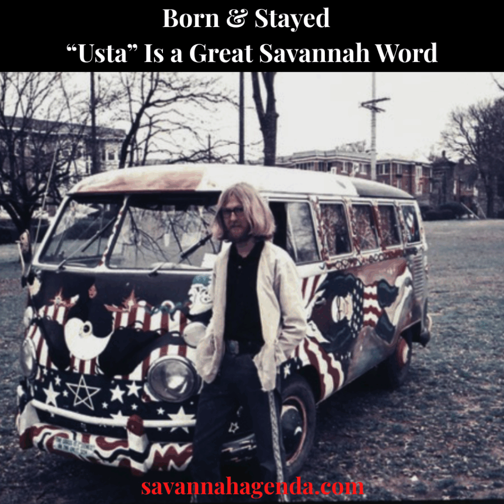 Old photo of long-haired guy standing in front of a painted up van.